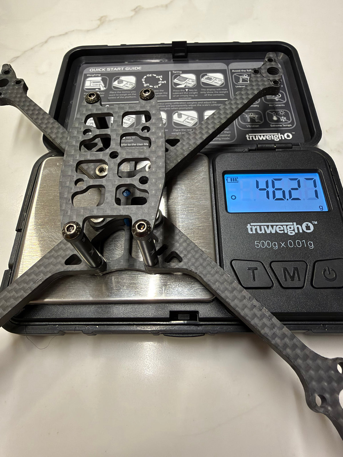 DinDrones OZR-5X 5" racing frame — 46.27 g on the scale